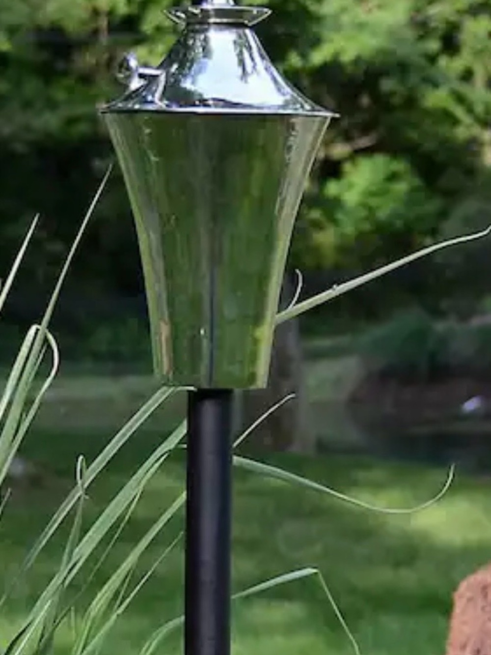 Kona deluxe garden torch in silver. Stake not included. Two torches available.